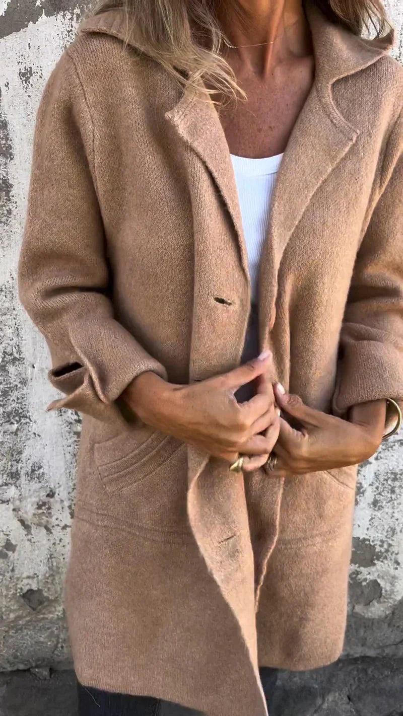 Virela - a long coat that effortlessly blends casual comfort with refined style