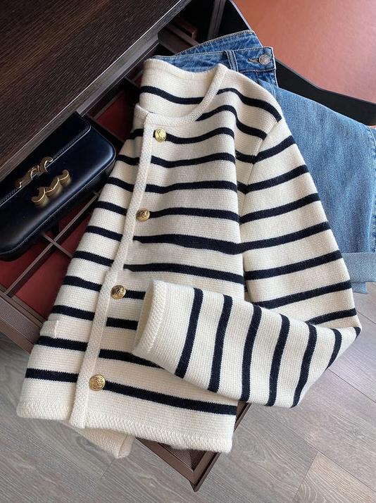 Carmina - a classic striped O-neck sweater that seamlessly blends comfort with sophistication