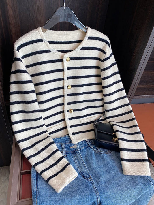 Carmina - a classic striped O-neck sweater that seamlessly blends comfort with sophistication