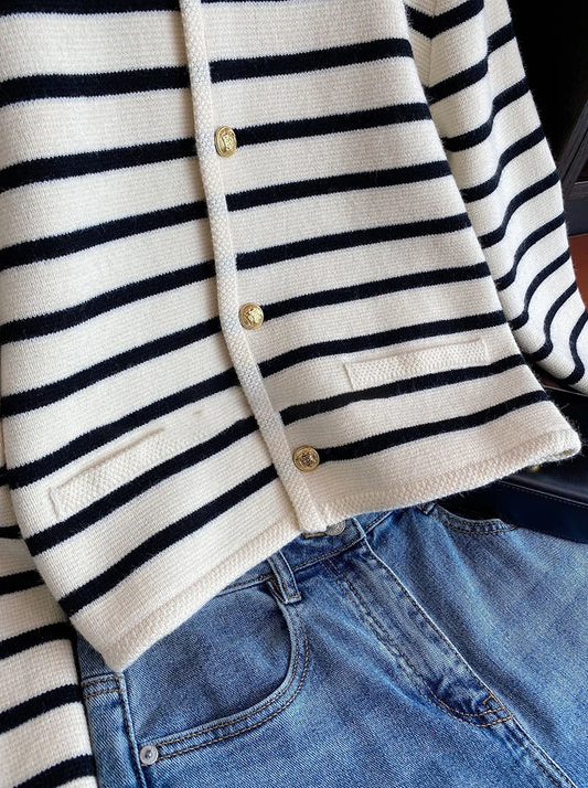 Carmina - a classic striped O-neck sweater that seamlessly blends comfort with sophistication