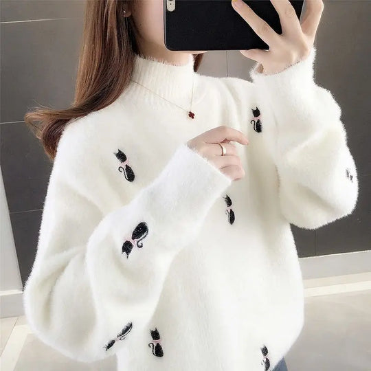 Lumira - the cozy kitten turtleneck sweater